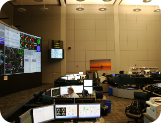 A person hard at work in the control room.